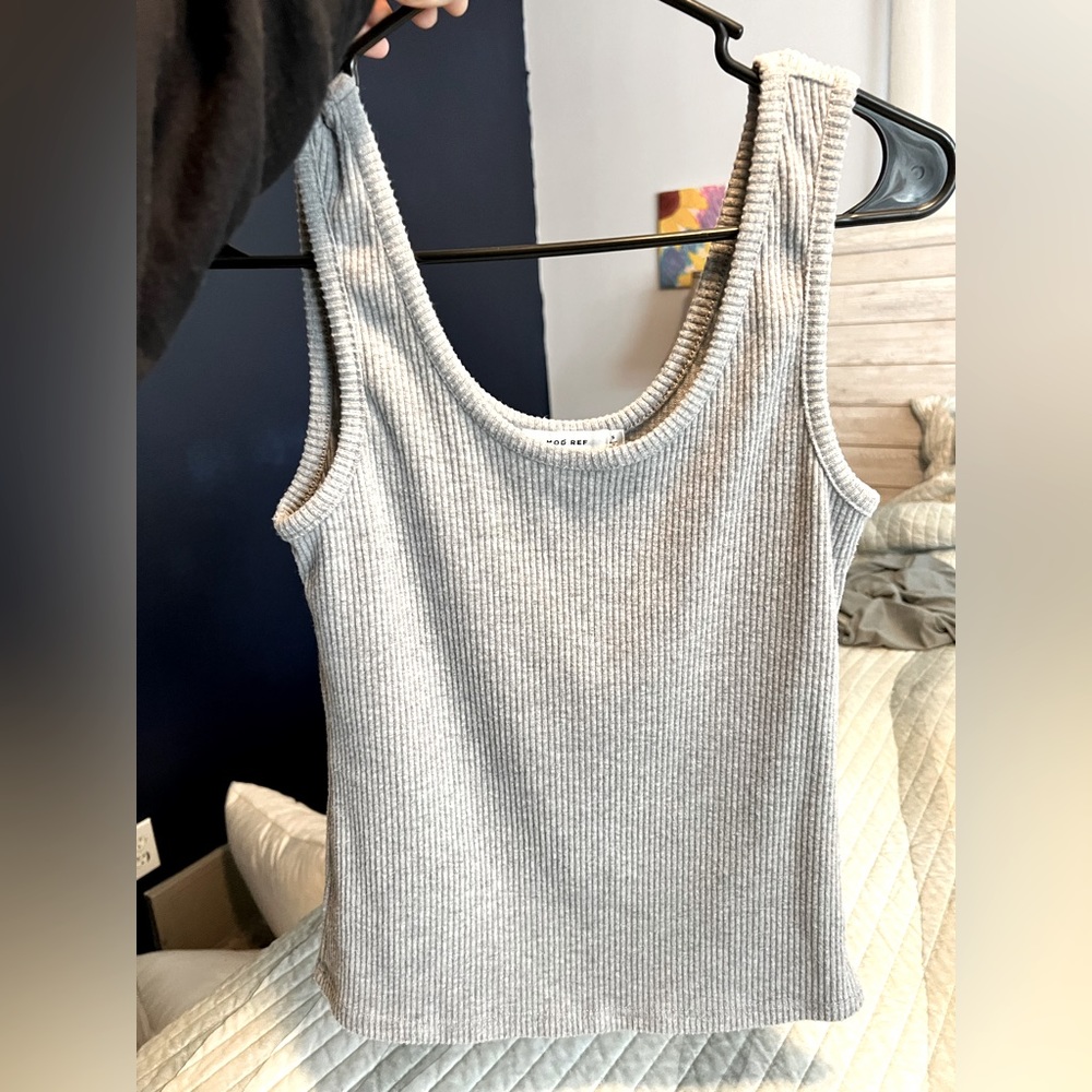 New, never worn. Without tags